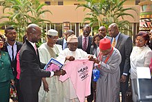 Adewole (center, holding the T-shirt) participating in World Cancer Day 2016 Runcie C.W. Chidebe, Executive Director and Prof. P.O. Ebigbo,Board Chair.jpg