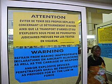 Warning posters in a Central African airport, 2012 Securite Aerienne Afrique.JPG