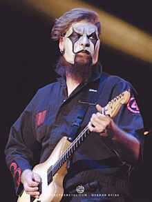 Root performing with Slipknot in 2016