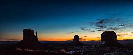 Snow-covered Monument Valley sunrise in January