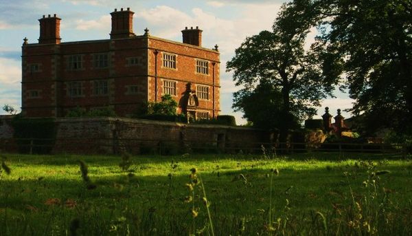 View of the Present Manor House of 1556 with door case of 1668 at Soulton