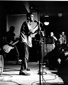 Government Issue performing at the Wilson Center in April 1981, showing members Brian Gay (left) and John Stabb (center)