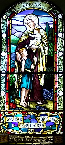 Stained glass of Dorcas within the church Stained glass window inside St Moluags Cathedral 2017.jpg