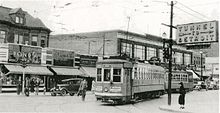 Streetcars in downtown Windsor in 1938, at the intersection of Ouellette Avenue and Wyandotte Street. Streetcars in downtown Windsor in 1938.jpg