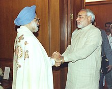 Modi meeting with then-Prime Minister of India Manmohan Singh in 2004 The Chief Minister of Gujarat Shri Narendra Modi calls on the Prime Minister Dr. Manmohan Singh in New Delhi on June 30, 2004.jpg