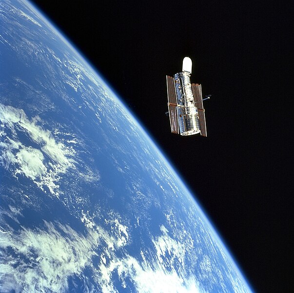 File:The Hubble Space Telescope (HST) floats gracefully above the blue Earth after release from Discovery's robot arm after a successful servicing mission.jpg