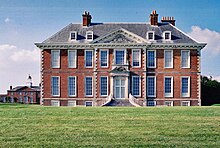 Wells spent the winter of 1887-88 convalescing at Uppark, where his mother, Sarah, was the housekeeper. Uppark-Sfront-01.jpg