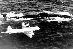 VP-10 P-3 over a Soviet Victor III submarine VP-10 AND VICTOR III WEB (4831815987).jpg