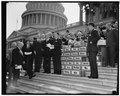 "Keep America Out of War" petitions presented to Congress. Washington, D.C., April 27. "Keep America Out of War" was keynote of four million petitions presented to members of Congress at the LCCN2016873481.tif