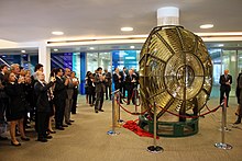 Unveiling of the decommissioned optic from Orfordness at the IMO HQ in 2015
