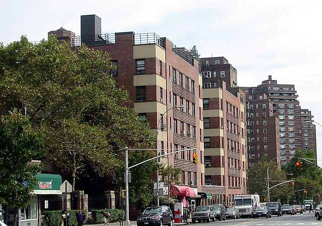 View of Grand Street. Amalgamated Dwellings (1930) in the foreground with two of the Hillman Housing buildings (1947-50) behind it. One of the East Ri