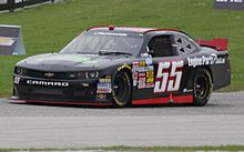 Andy Lally at Road America in 2014. 55 Andy Lally NASCAR Nationwide 2014 Gardner Denver 200 at Road America.jpg