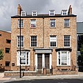 56 and 58, Lord Mayor's Walk. Mirrored pair of houses. c1845-50. Grade II listed.