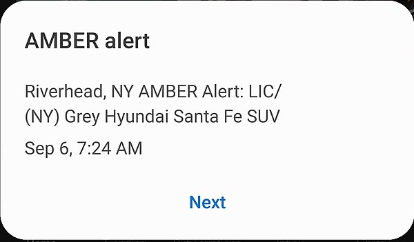 An Amber alert as seen on Android, advising users to call 911 if they find a car with a matching description.