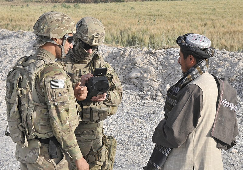 File:A linguist assists U.S. Army Pfc. John T. Roquemore, center, with the 2nd Battalion, 23rd Infantry Regiment, in conducting biometric enrollments during a traffic checkpoint in the Panjwai district, Kandahar 130516-A-MX357-038.jpg