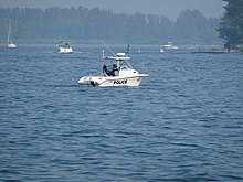 An OPP patrol boat in the Toronto Harbour, 2015 A police boat, ready to protect athletes at the Pan American Games, 2015 07 18 (12) (19320802653).jpg