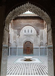 Courtyard of Al-Attarine Madrasa, Fez, Morocco, unknown architect, 14th century[101]