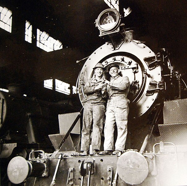 File:American and British engineers on American train engine somewhere in Iran, 1943 (24839966600).jpg