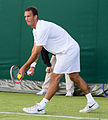 Ante Pavić competing in the third round of the 2015 Wimbledon Qualifying Tournament at the Bank of England Sports Grounds in Roehampton, England. The winners of three rounds of competition qualify for the main draw of Wimbledon the following week.