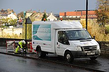 An Openreach engineer working on the "Superfast West Yorkshire" project in Wetherby (2014) at a manhole BDUK WYorks Wetherby9.jpg