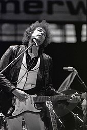 Dylan performing in the De Kuip Stadium, Rotterdam, June 23, 1978 Bob Dylan 1978.jpg