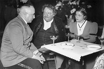 After a performance of Schiller's Intrigue and Love at the Théâtre des Champs-Élysées in 1941, from left to right: Dr. Ley, Reich organization leader; Heinrich George, Schiller Theater Intendant; and German actress Gisela Uhlen (Bundesarchiv)