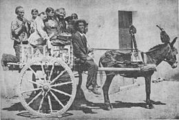 Carretto Siciliano, Family on a Sunday outing with a donkey