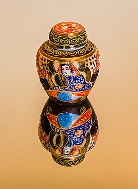 Chinese decorative vase on glass. Focus stack of 17 photos.