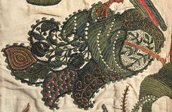 Fanciful leaf in crewelwork, detail of a curtain, English, c. 1696. Victoria and Albert Museum T.166-1961. Crewel curtain c 1696 England leaf detail.jpg