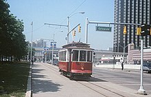 An ex-Lisbon streetcar on Jefferson Avenue in 1991 Detroit Downtown Trolley on Jefferson Avenue, May 1991.jpg