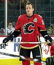 Dion Phaneuf, seen warming up before a game, set a Flames rookie defensive scoring record, recording 20 goals in 2005-06. Dion Phaneuf 2008.JPG