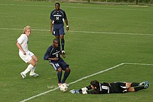 UConn (in blue) v Duke in 2006 Duke-UConn 2006-08-19 IMG 4188 (219553155).jpg