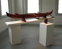 A koa wood canoe model on display inside East Hawaii Cultural Center Canoe Exhibit.jpg