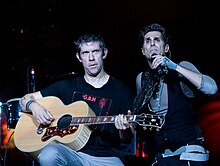 Eric Avery (left) and Perry Farrell of Jane's Addiction in 2009