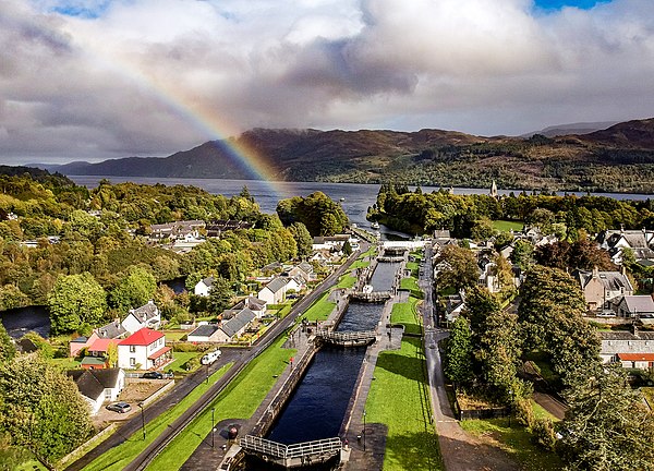 Locks on Caledonian Canal in Fort Augustus, Loch Ness in the background