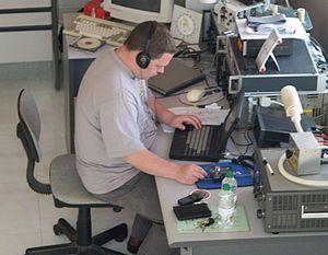 A DXer operates during a holiday DXpedition to Muscat, Oman. G0RTN operating amateur radio.jpg