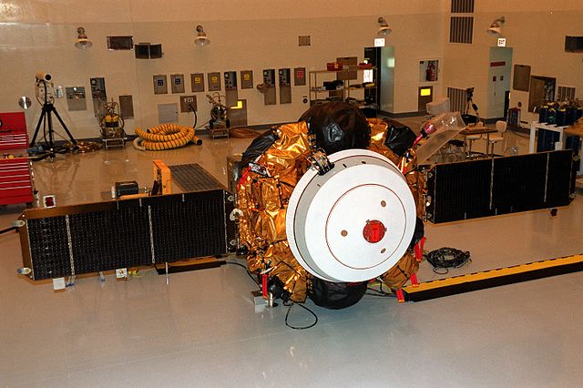The spacecraft in the Payload Hazardous Servicing Facility, with both solar arrays deployed