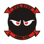 Alternate squadron patch picturing the evil eyes HMM-163.png