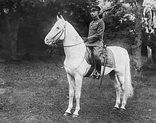 The Emperor on his favorite white horse Shirayuki (lit. 'white-snow') Hirohito Sirayuki.jpg