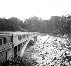 The St. Phillips Road bridge, pictured the day after, was under at least 10 ft (3.0 m) of water at the height of the flood. Hurricane Hazel -- St.Phillips Road.jpg