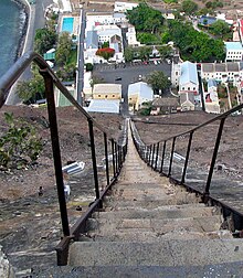 The view down Jacob's Ladder, looking onto The Castle (white buildings between the gardens and the swimming pool). Jamestown Jacobs Ladder.jpg