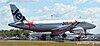 A Jetstar flight landing at Sunshine Coast Airport