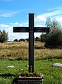 Detalj av korset på Kämpinge kyrkplats