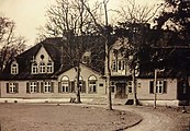 Historische opname van de plaatselijke school, het voormalige landhuis