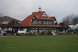 The wooden cricket pavilion at Leyton Cricket Ground in London (1886)