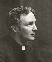 Clean shaven clergyman in black cassock, aged about 30 years