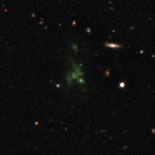 Composite of two different images taken with the FORS instrument on the Very Large Telescope of the Lyman-alpha blob LAB-1 in the constellation of Aquarius. Credit ESO/M. Hayes. Lyman-alpha blob LAB-1.jpg