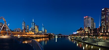 Melbourne is the largest settlement that the Yarra flows through. The Yarra at central Melbourne is shown here at night, with the central business district on the left and Southbank on the right