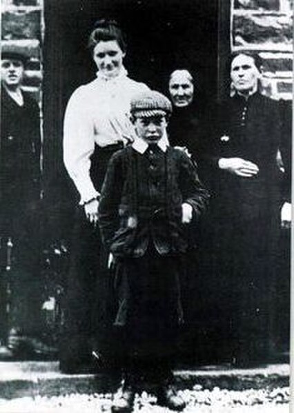 Michael Collins at the age of 8 with his family.