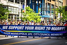 The Minneapolis City Council expressed opposition to Minnesota Amendment 1 in 2012. Minneapolis City Council Members at Pride (7434991130).jpg